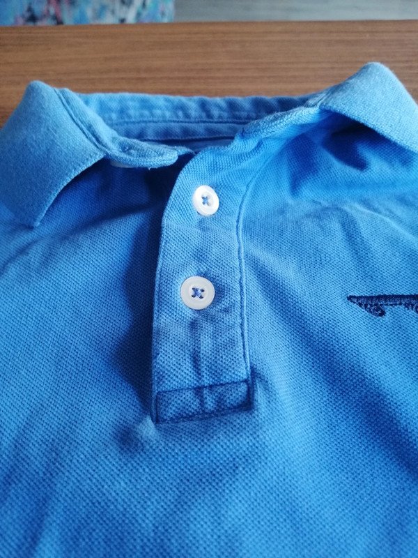 Hellblaues Poloshirt von Tchibo - Gr. 110/116