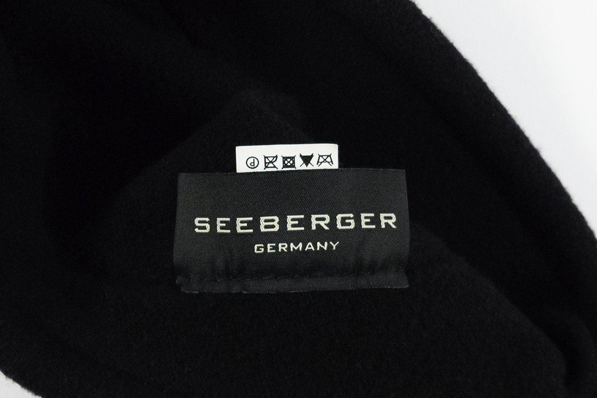 Mütze mit Schleife schwarz Schurwolle Wolle (Seeberger)