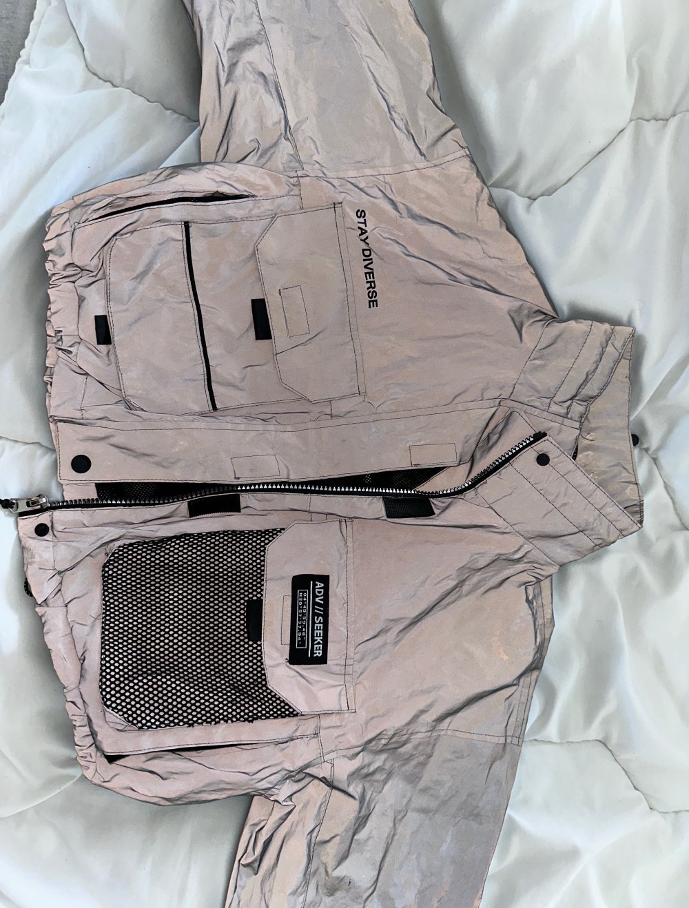 kurze reflektierende Jacke