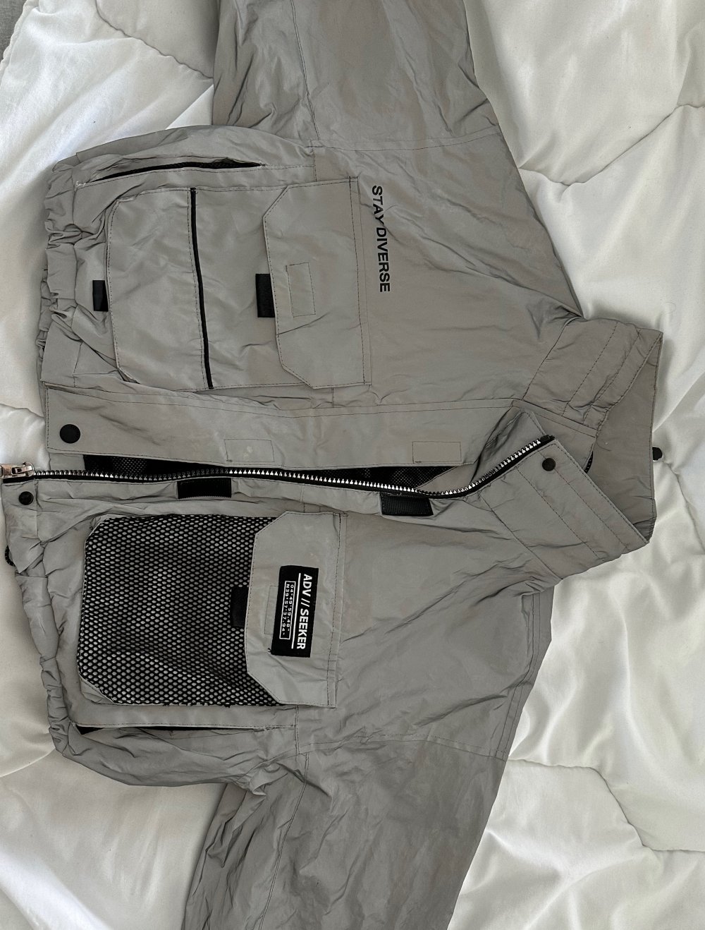 kurze reflektierende Jacke