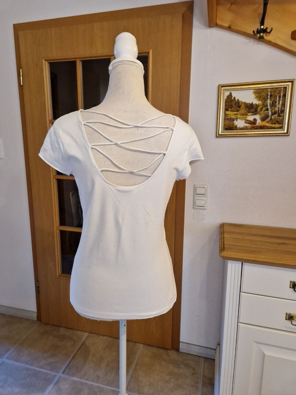 Colours of the world.  Bequemes T-Shirt. Größe M. 