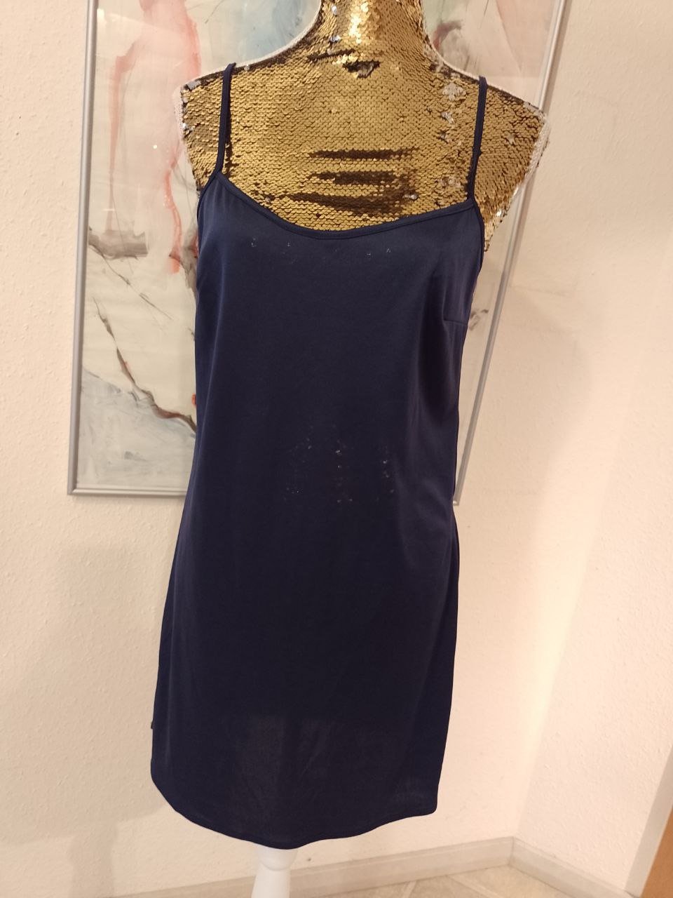 Top.  Polyester + Elastan.  Größe S-M. 
