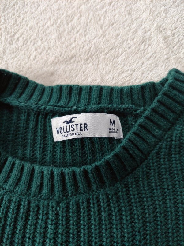Grüner Strickpullover