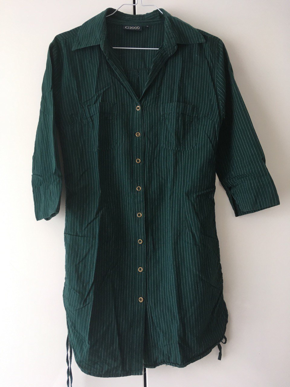 Lange dunkelgrüne Bluse