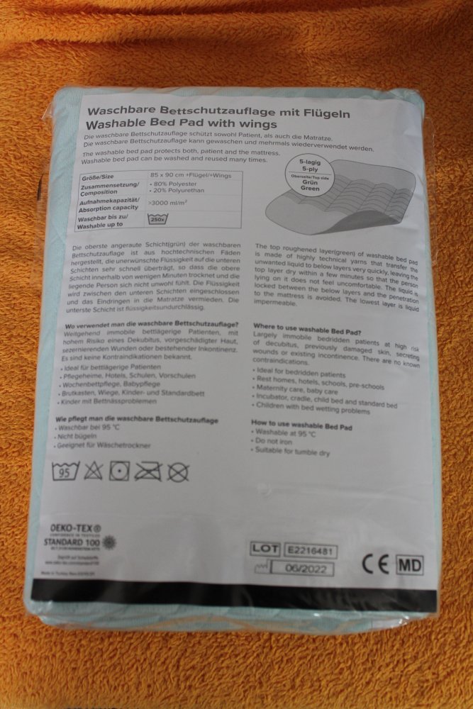 Neue waschbare Bettschutzauflage mit Flügeln von Medi-Inn für Babybett oder Altenpflege