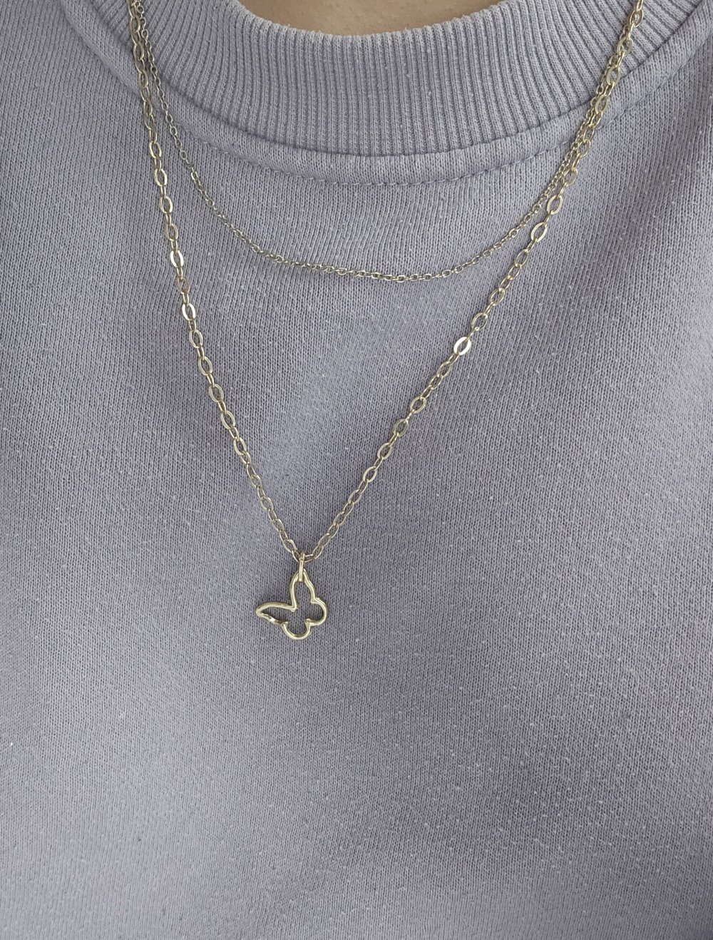 Kette in Gold mit Schmetterlingsanhänger