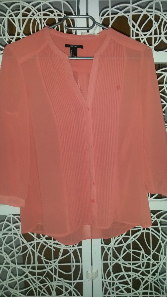leuchtende Bluse