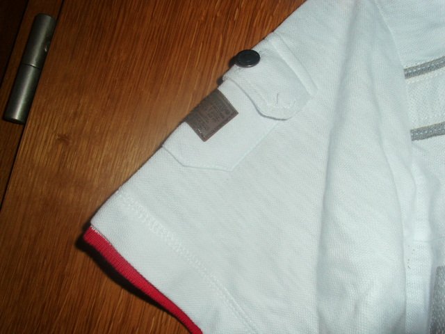 Poloshirt von Geographical Norway, weiß mit Motiven, Gr. L