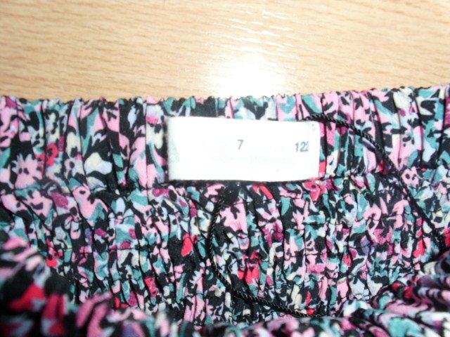 Rock von Zara, schwarz-pink, Gr. 122