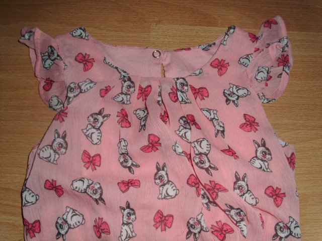 Kleid, rosa mit Motiven, Gr. 122