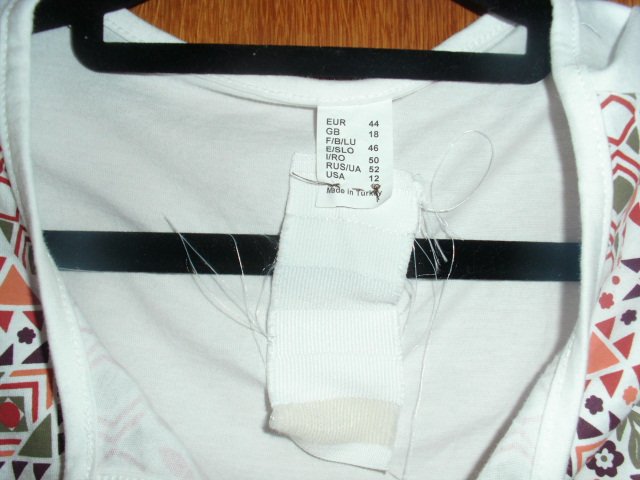Schlupfshirt, wollweiß mit  Motiven, Gr. 44