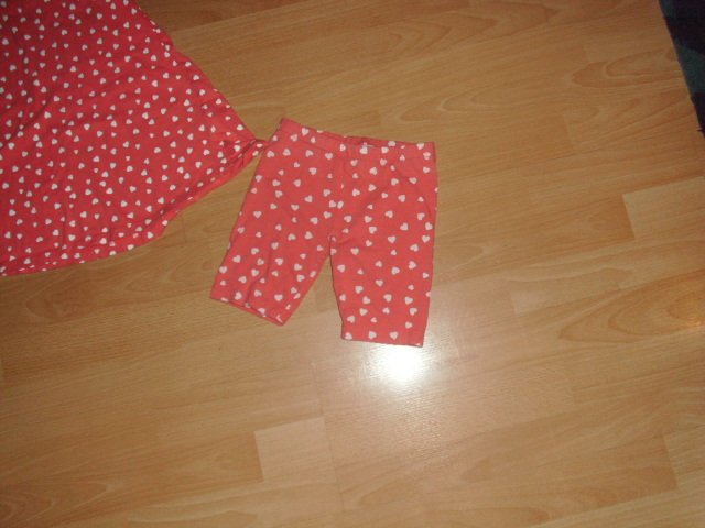 Kleid mit Radler von Topolino, orange mit Herzchen, Gr. 104