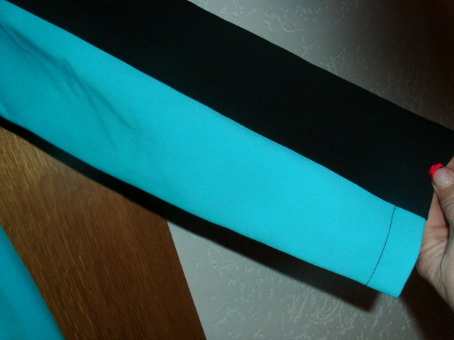 Softshelljacke von Catamaran Sports, türkis-schwarz, Gr. 40/42