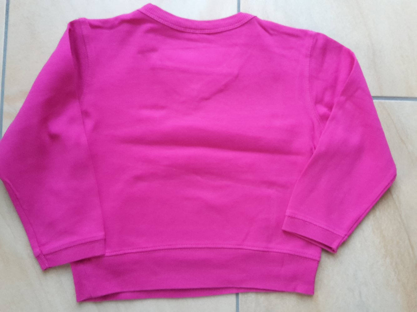 schönes LAShirt mit Glitzer in Gr. 104