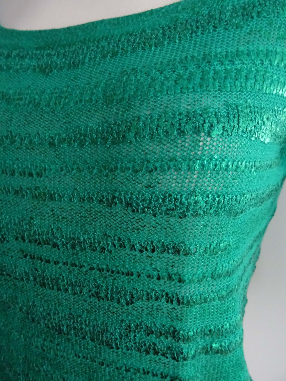 grüner Pullover