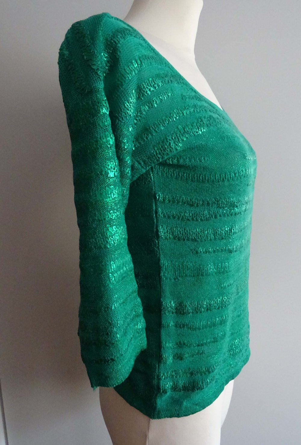 grüner Pullover