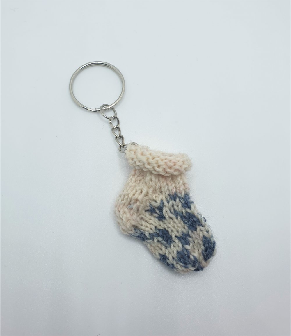 Gestricktes Söckchen für den Einkaufswagenchip 