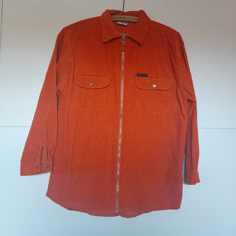 Orangene Kordjacke mit Reißverschluss