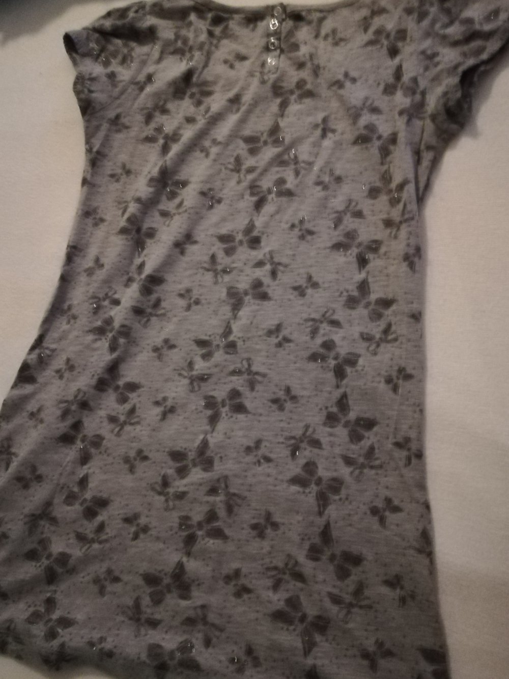 Graues Shirt von H&M mit glitzernden Schleifen, Gr. 36