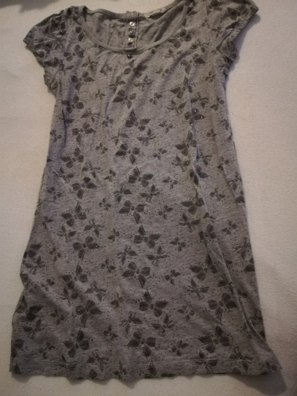 Graues Shirt von H&M mit glitzernden Schleifen, Gr. 36