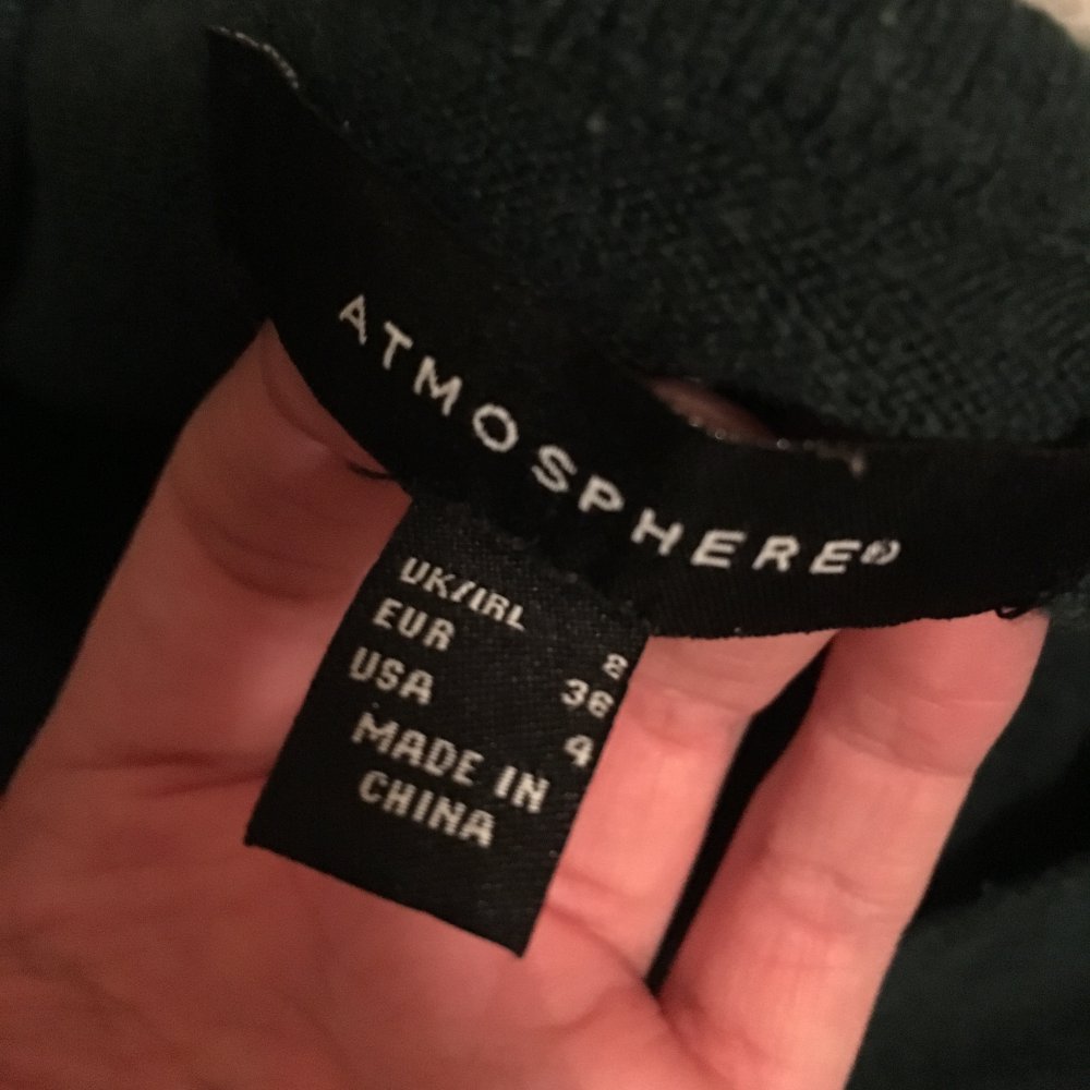 grüner Pullover