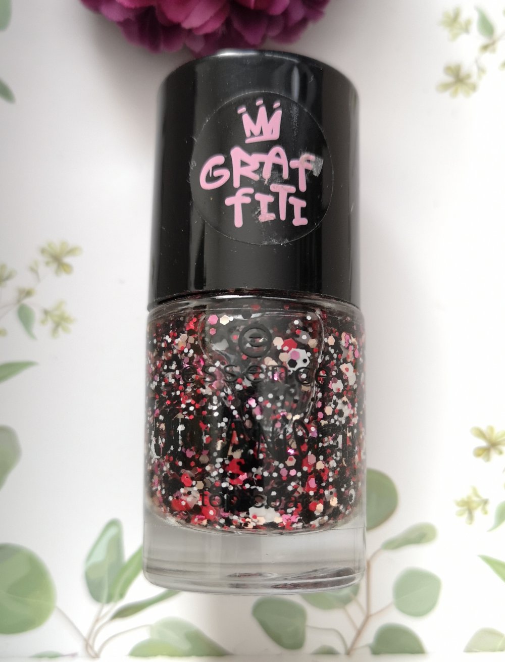 essence Topcoat Nagellack Glitzer schwarz/rot