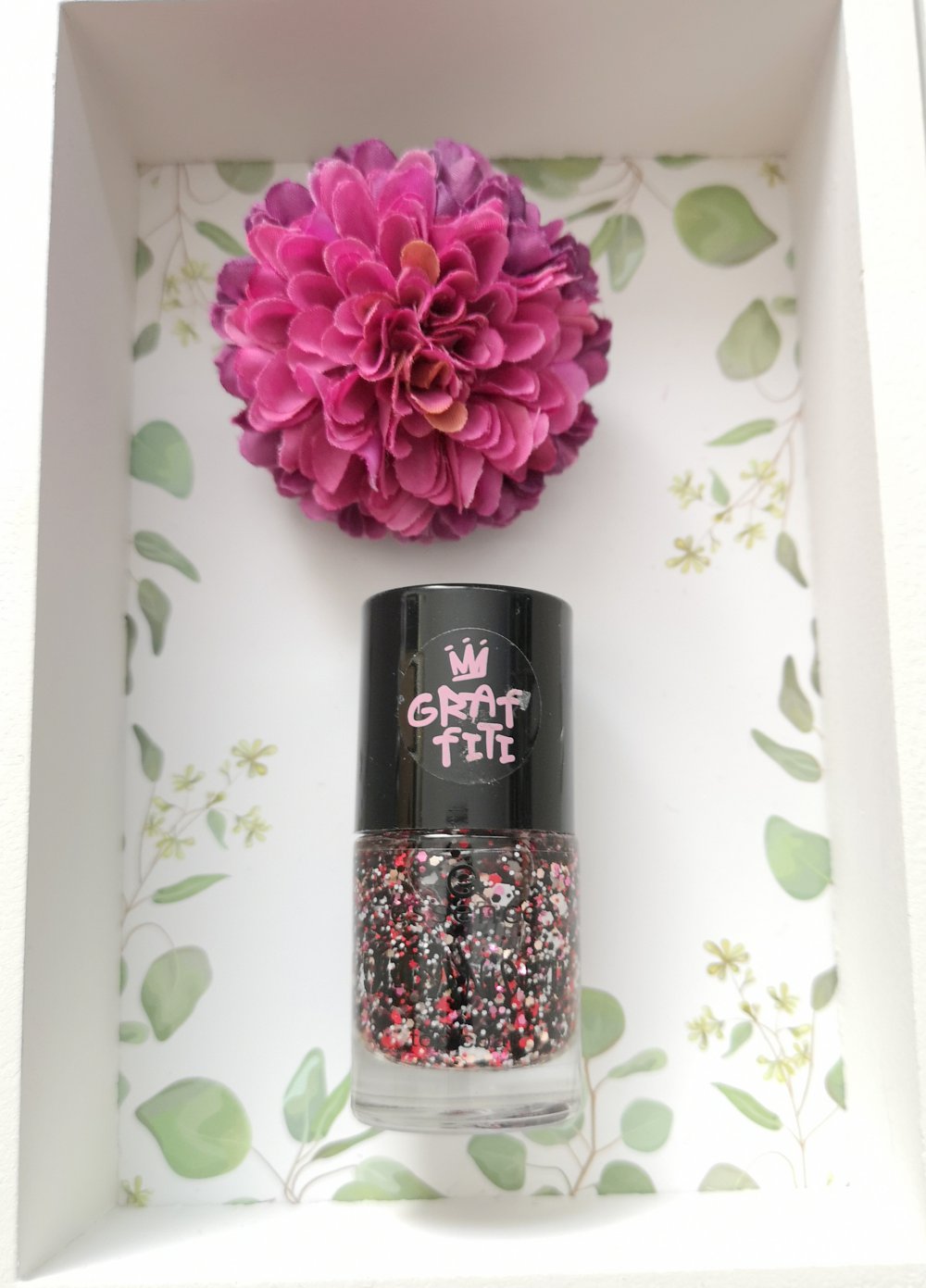 essence Topcoat Nagellack Glitzer schwarz/rot