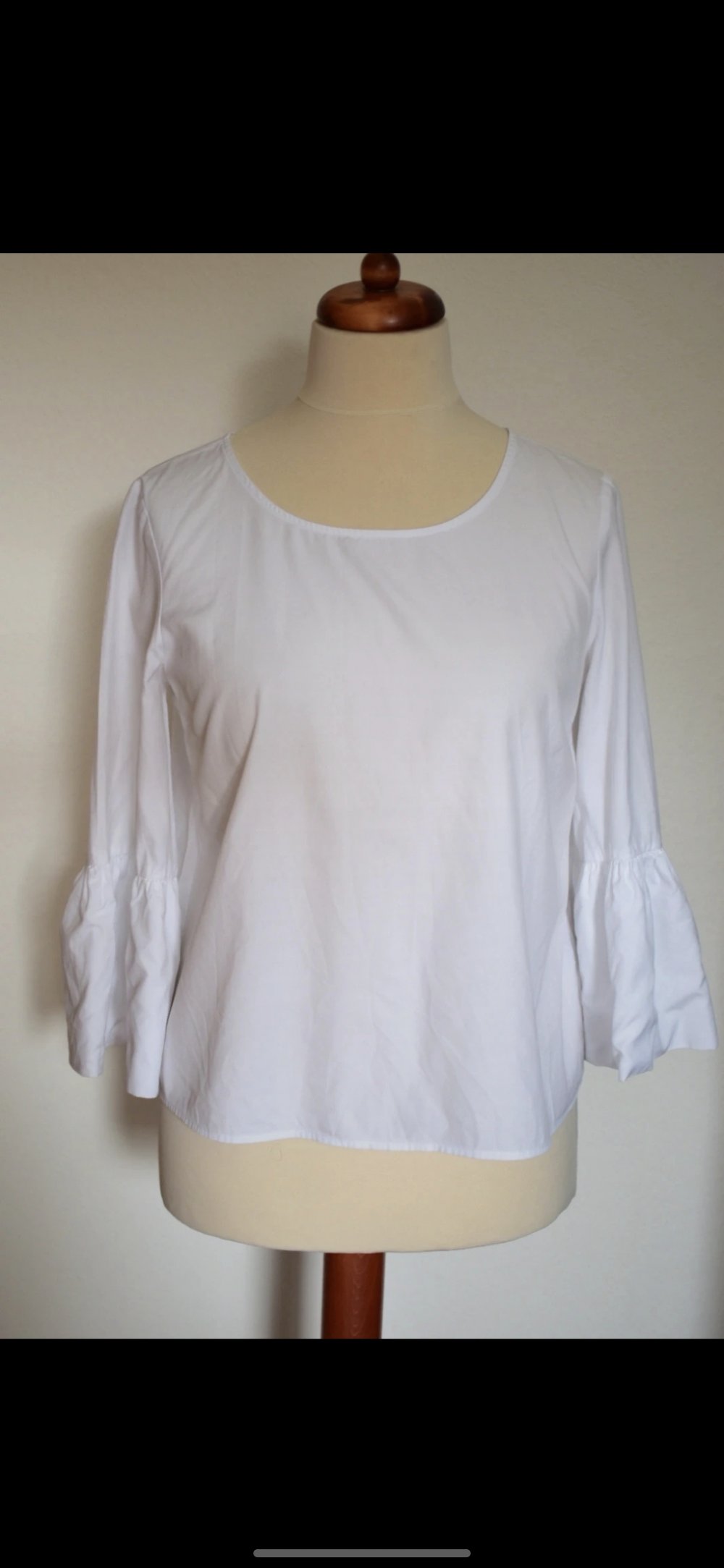 Weiße Bluse mit Volants