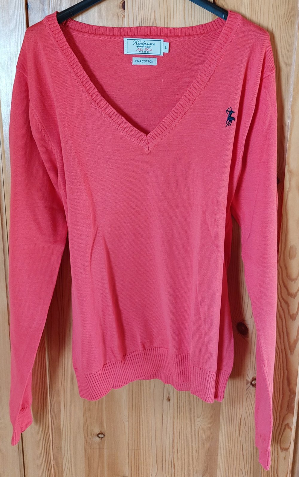 Korallfarbener Pullover 