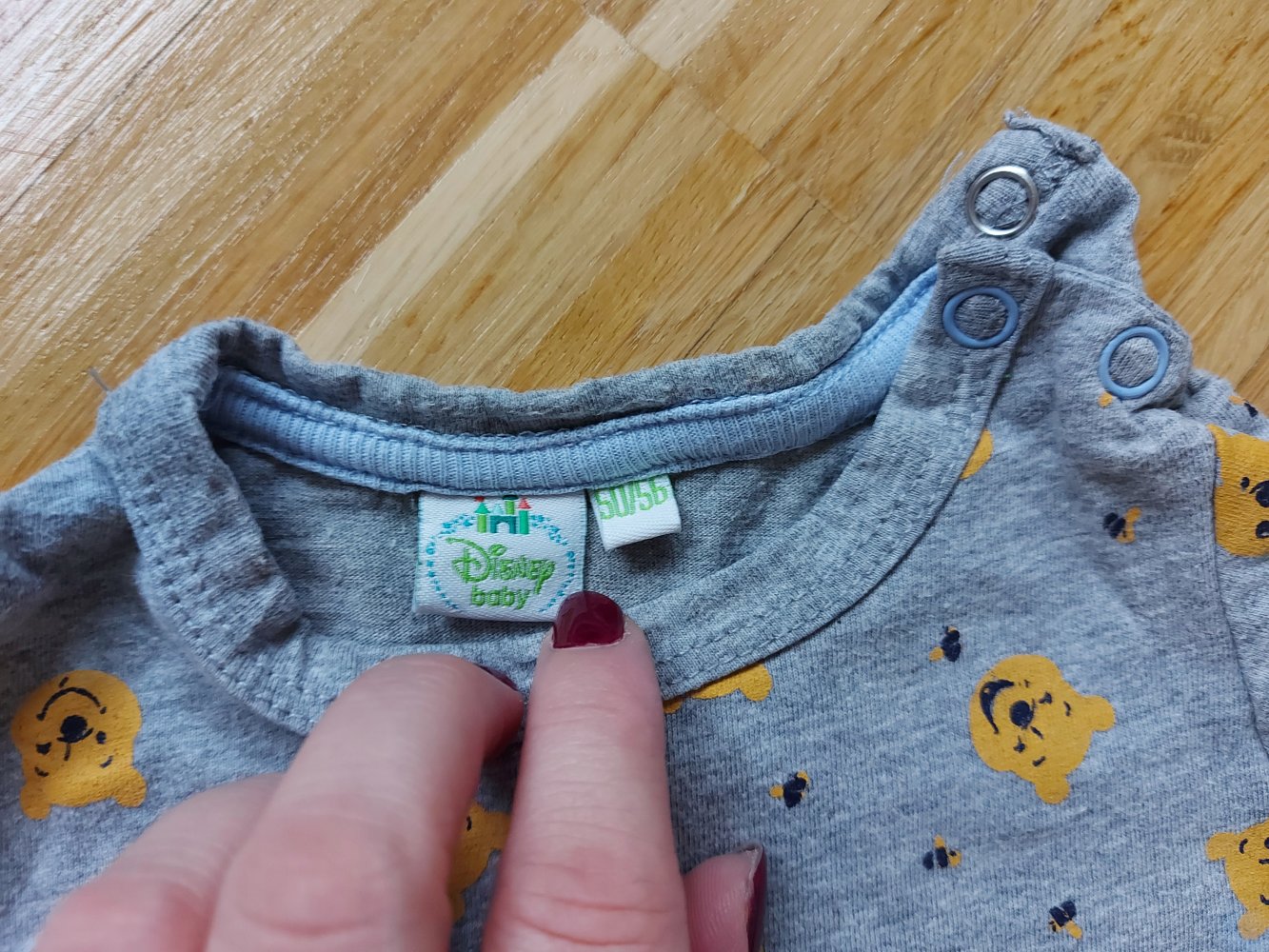 langärmliger grauer Babypullover mit Winnie the Pooh Gr. 50/56 Longsleeve 