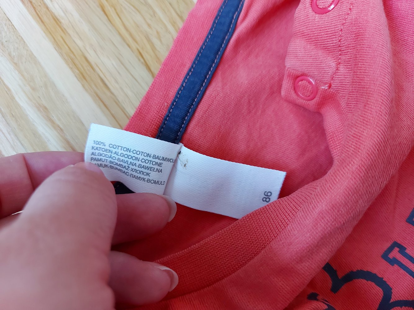 kurzärmliges orangerotes T-Shirt mit Löwen Gr. 86 I run this team
