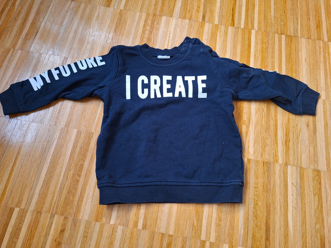 langärmliger dunkelblauer Babypullover I create my future