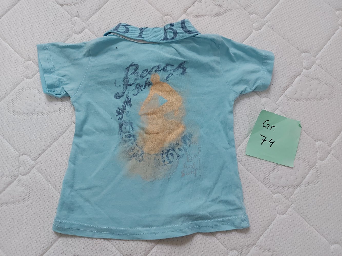 kurzärmliges hellblaues Baby-Poloshirt Gr. 74