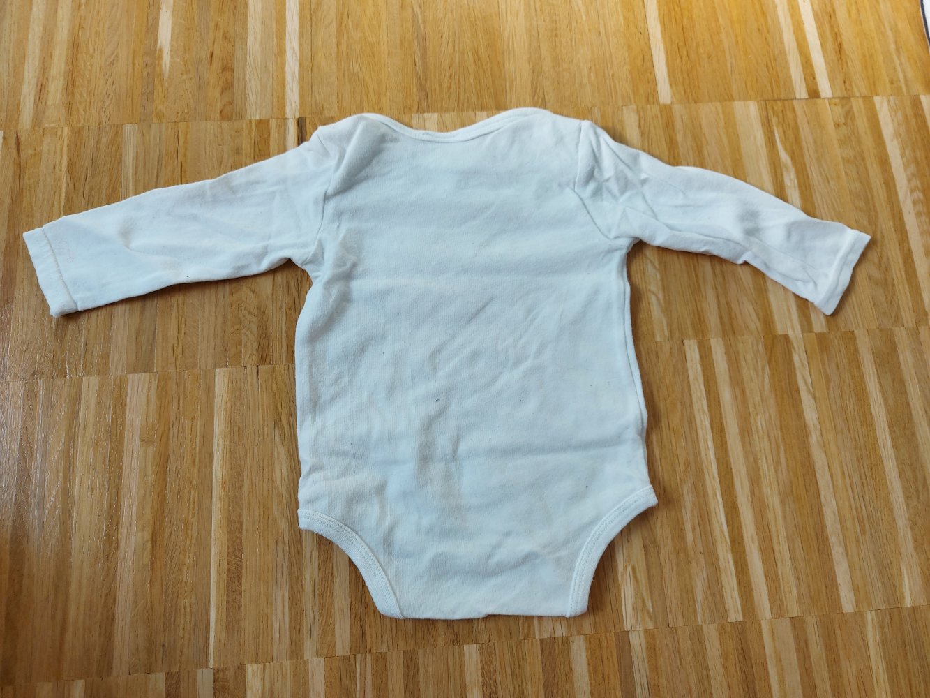 weißer Langarmbody Gr. 50/56
