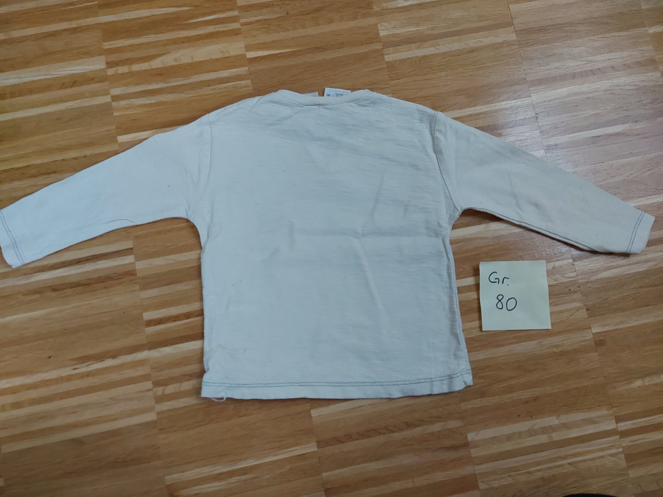 langärmliger cremeweißer Babypullover Born for Speed Gr. 80