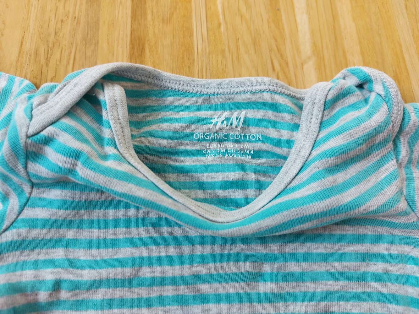 graublau gestreifter Langarmbody von H&M Gr. 56