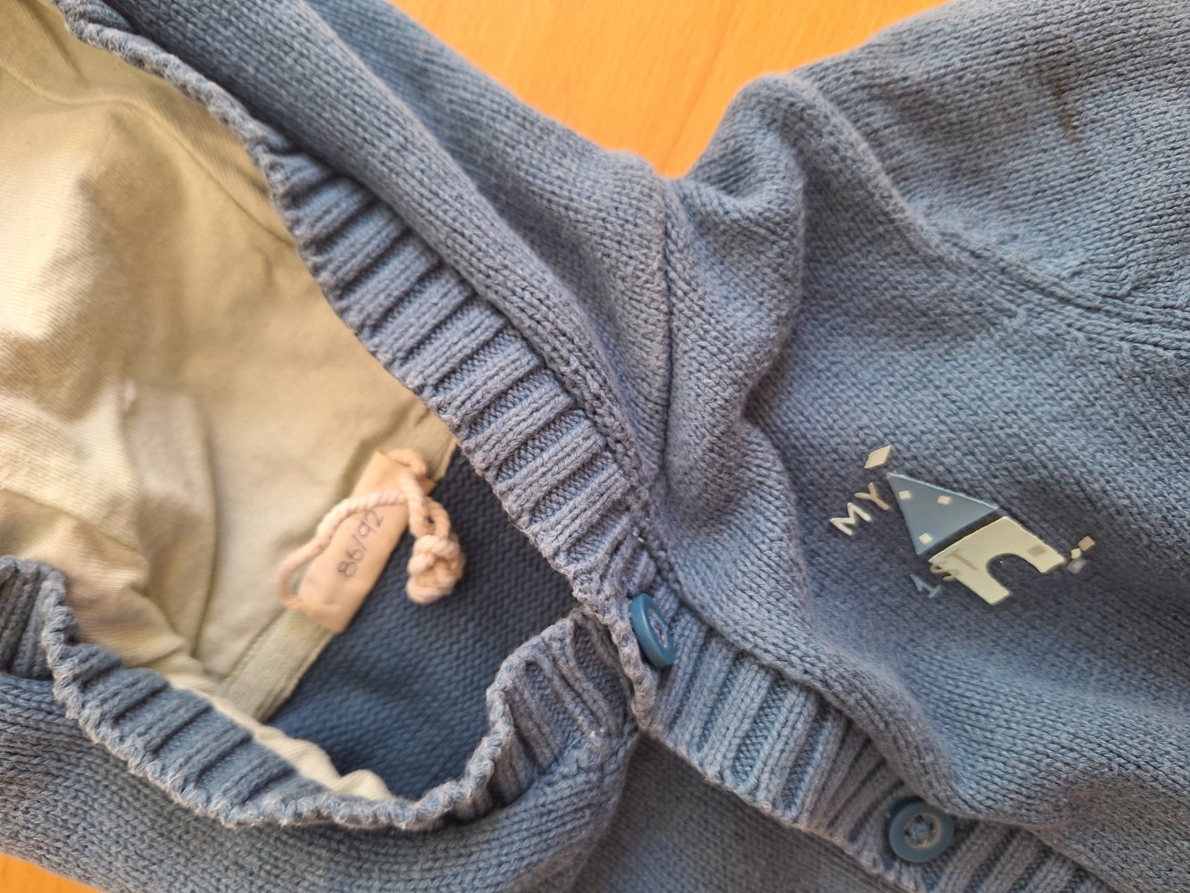blaue Kapuzenstrickjacke Gr. 86/92
