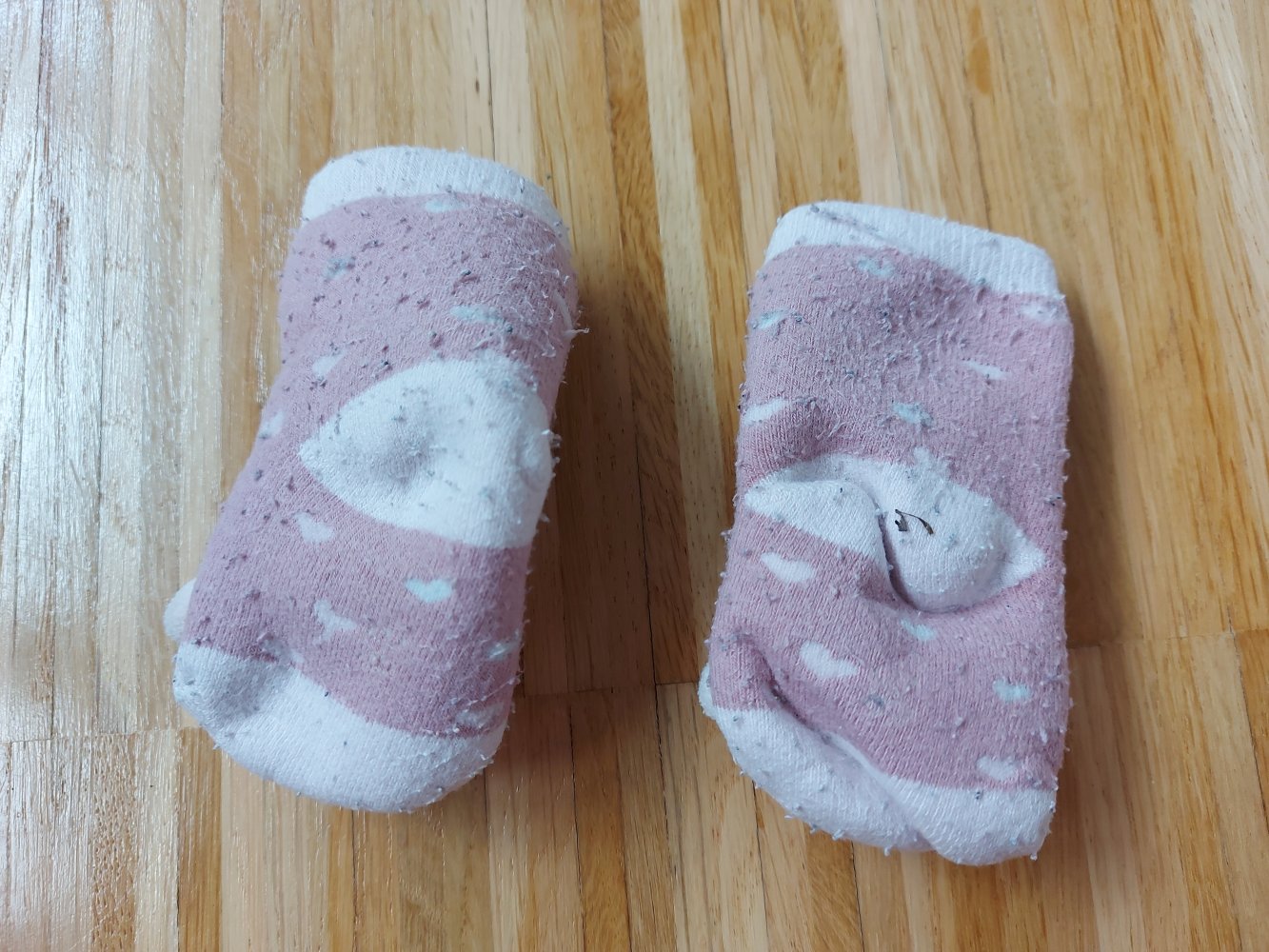 Pinke Rasselsöckchen mit Schäfchen