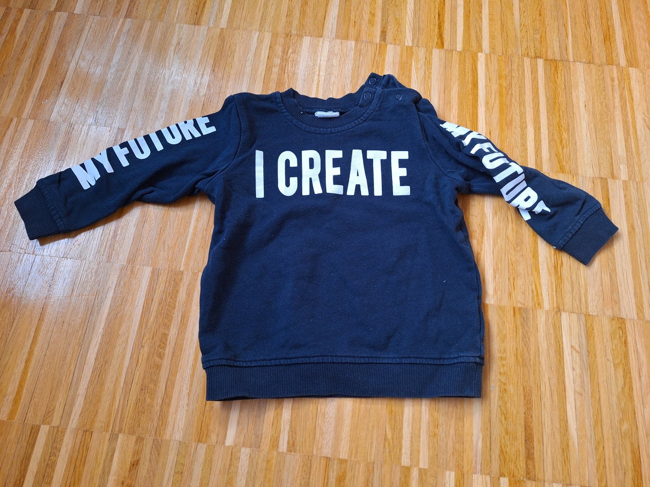 langärmliger dunkelblauer Babypullover I create my future