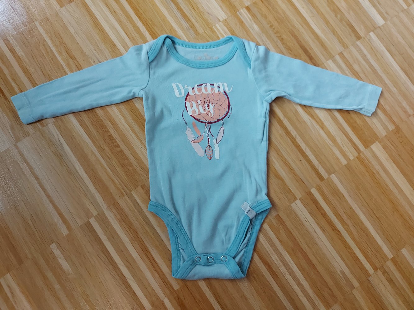 Langärmliger türkisblauer Babybody mit Traumfänger 
