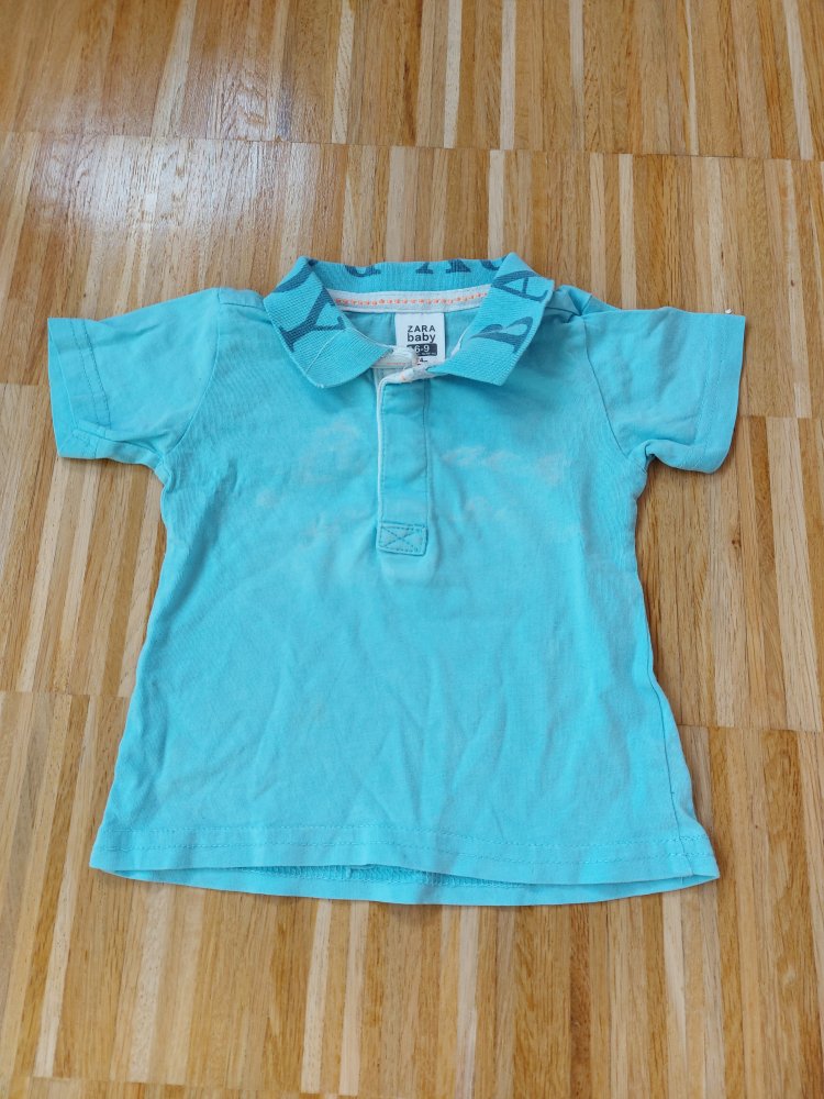 kurzärmliges hellblaues Baby-Poloshirt Gr. 74