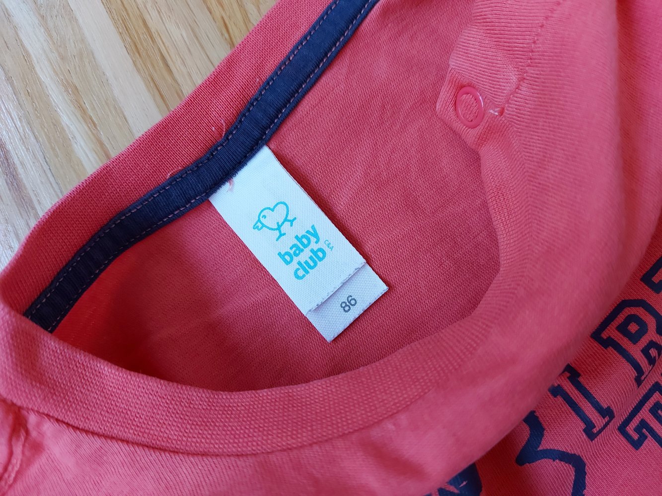 kurzärmliges orangerotes T-Shirt mit Löwen Gr. 86 I run this team