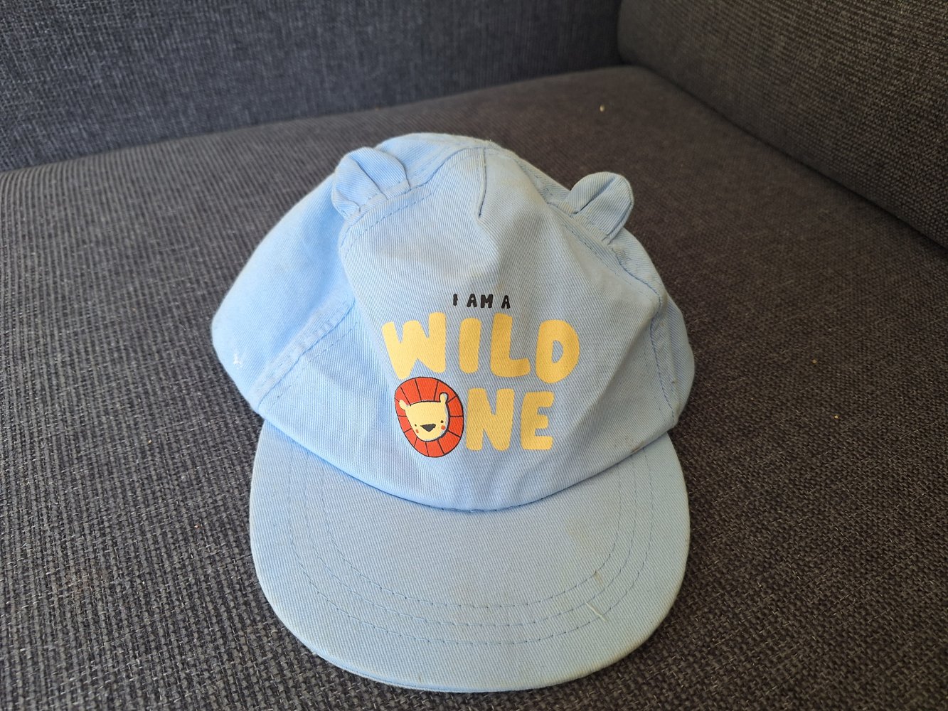 Hellblaues Käppi I am a wild one mit Löwe, Gr. 86-98