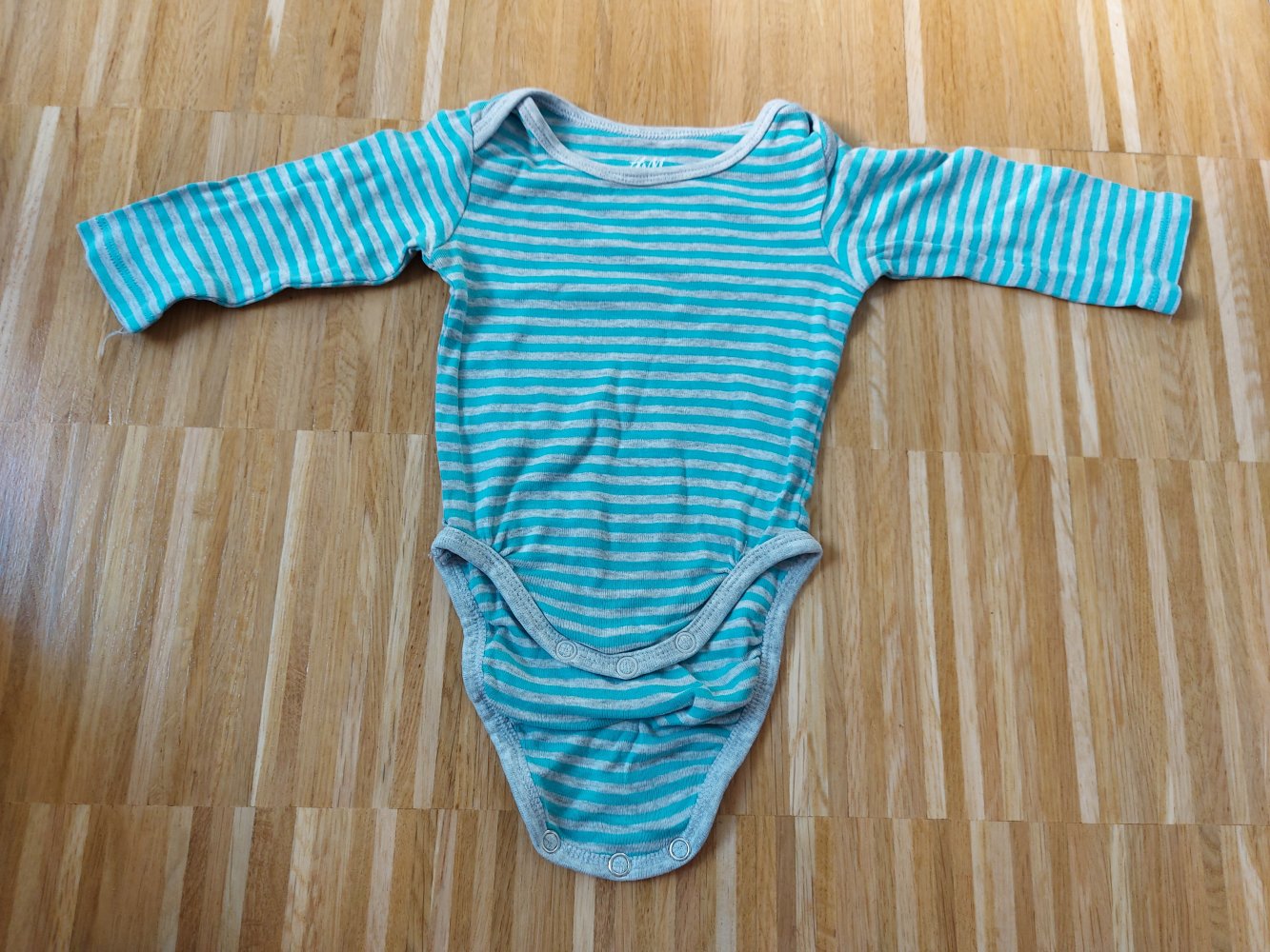 graublau gestreifter Langarmbody von H&M Gr. 56