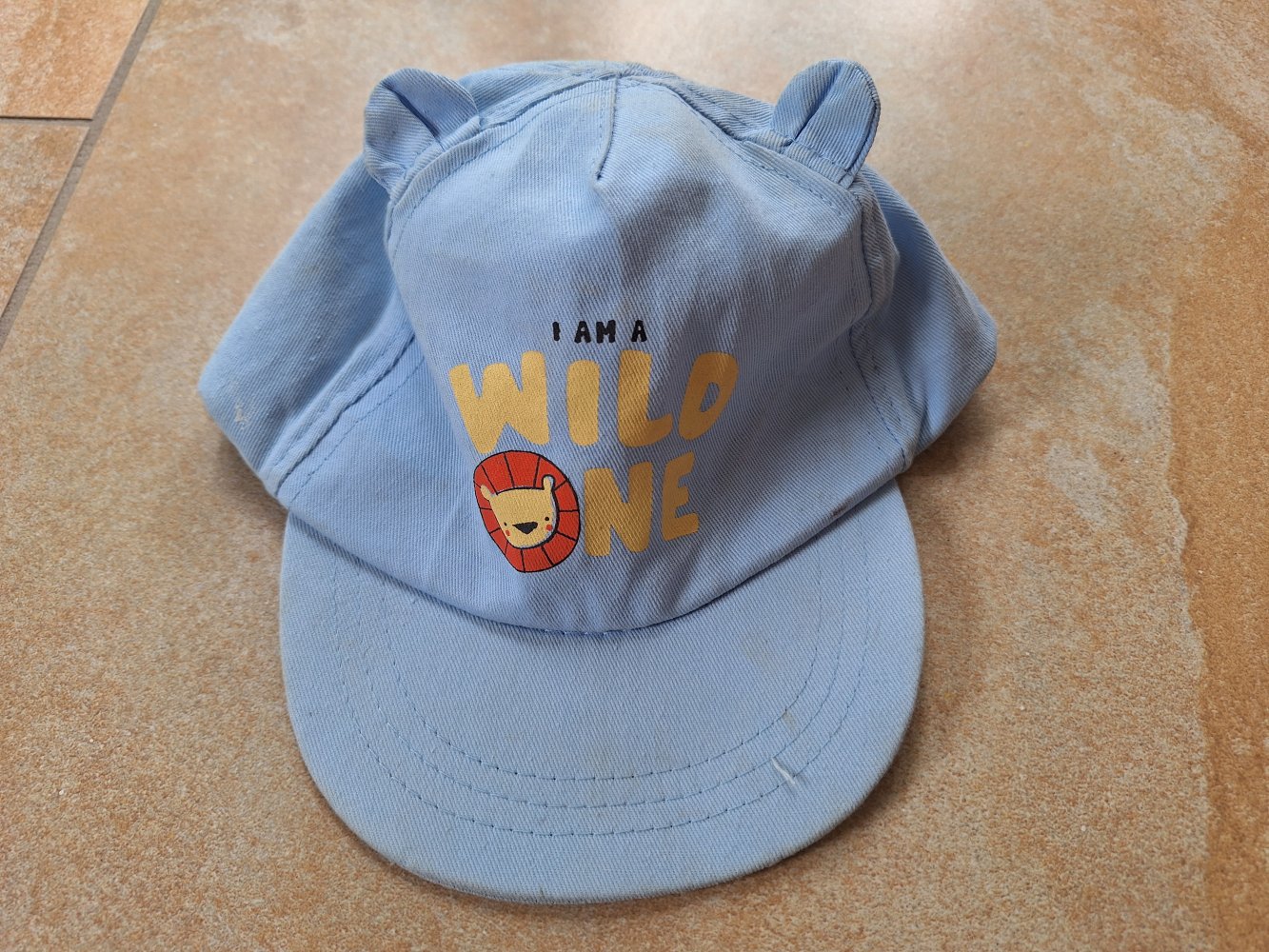 Hellblaues Käppi I am a wild one mit Löwe, Gr. 86-98