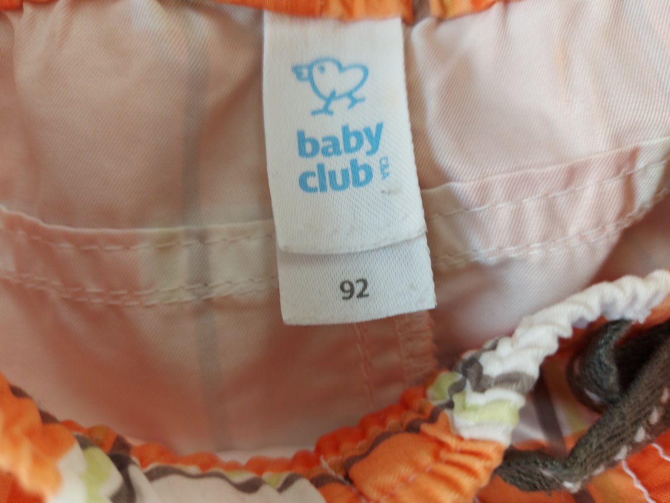 Kurze orange karierte Sommerhose Gr. 92