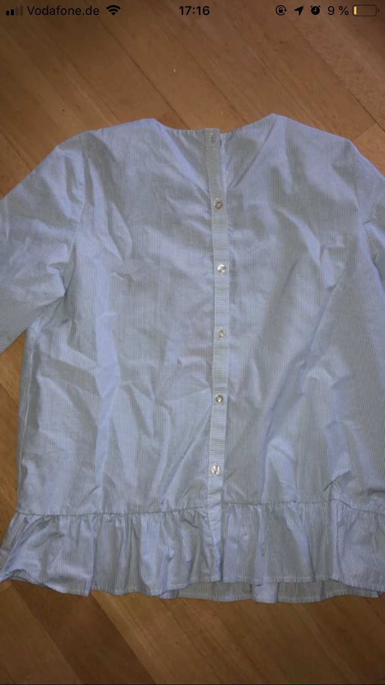 Gestreifte Bluse mit einem pinken Vogel