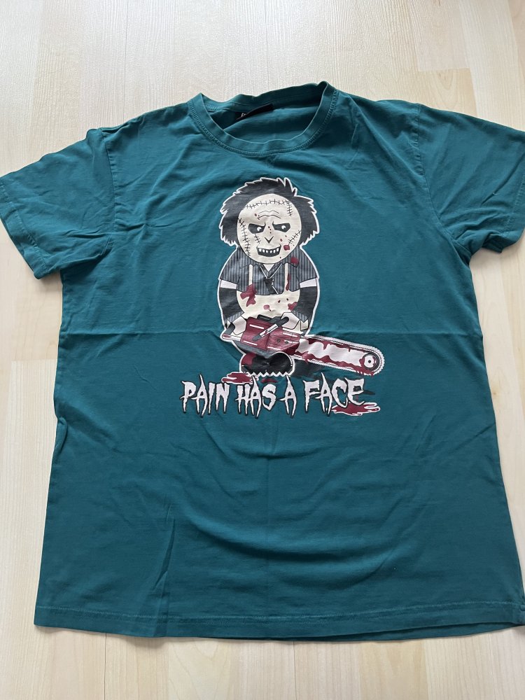 Horror funshirt gr. M leatherface / pain has a face / grün